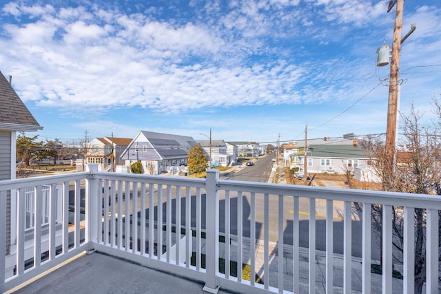 balcony featuring a residential view