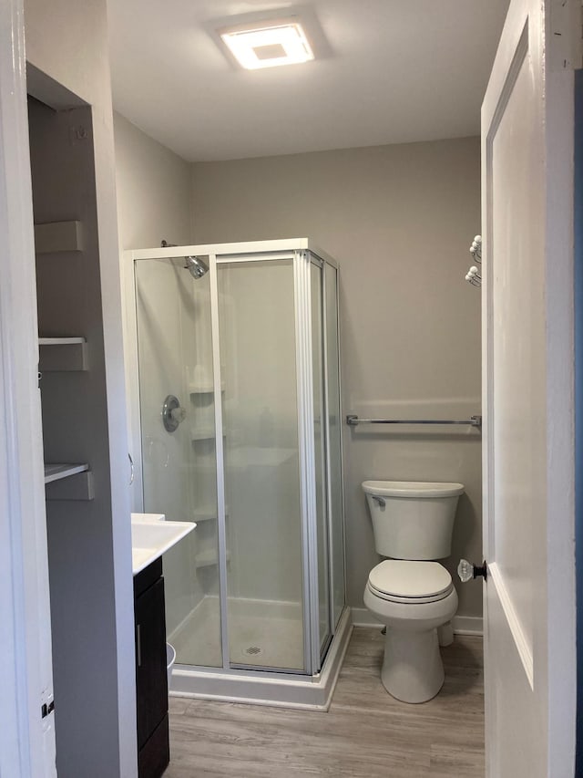 217 Ridgewood Ave, Villas, NJ 08251 - bathroom featuring wood finished floors, a stall shower, and vanity