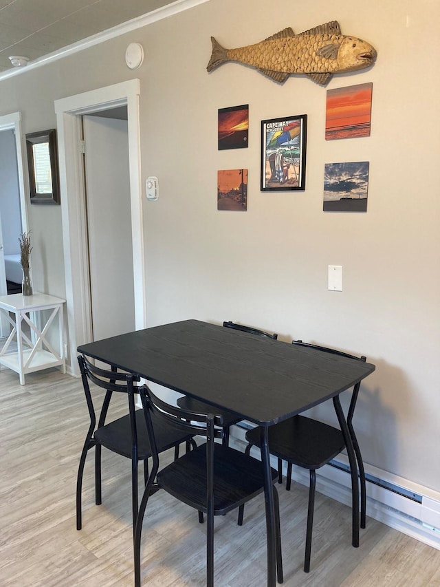 217 Ridgewood Ave, Villas, NJ 08251 - dining area with light wood finished floors and ornamental molding