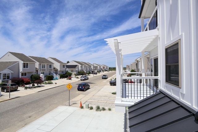 143 Austin Ave Unit 143, Lower Township, NJ 08260 - view of asphalt street with a residential view, traffic signs, sidewalks, and curbs