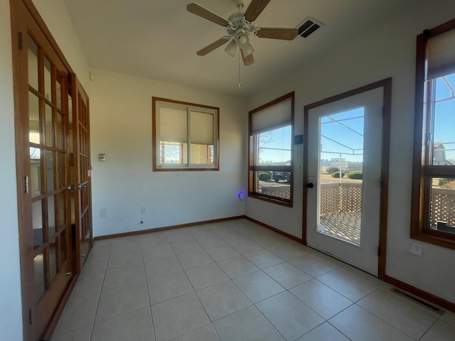 interior space featuring ceiling fan