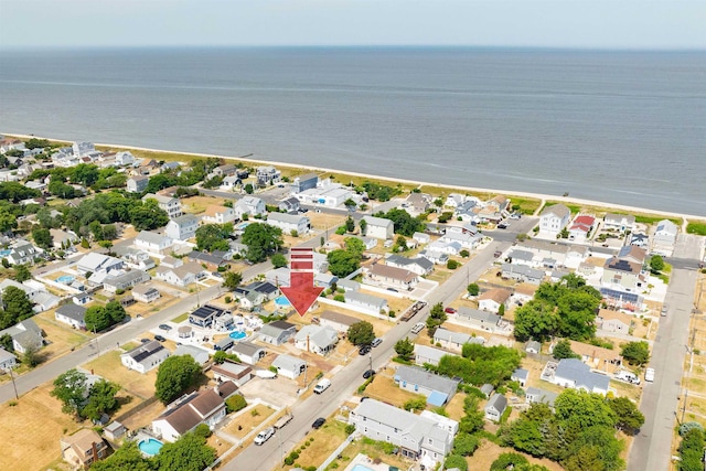 aerial view with a water view and a residential view