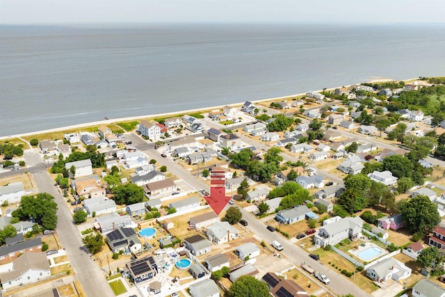 aerial view featuring a water view and a residential view