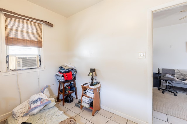 miscellaneous room with cooling unit, light tile patterned flooring, and baseboards