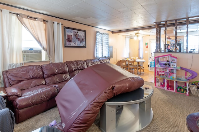 living room with cooling unit and carpet flooring