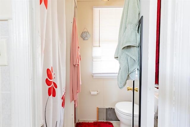 bathroom featuring toilet