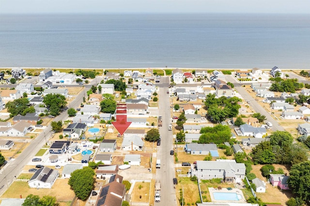 aerial view featuring a water view and a residential view