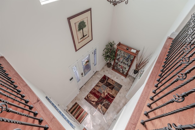 living room with a towering ceiling