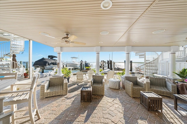 view of patio / terrace with ceiling fan and an outdoor hangout area