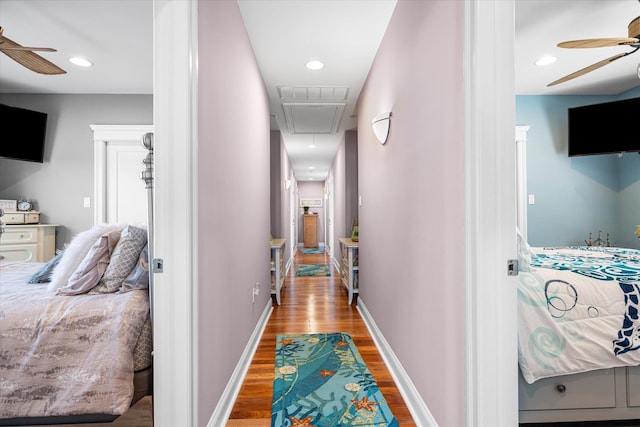 hallway featuring hardwood / wood-style flooring