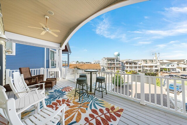 wooden deck with ceiling fan