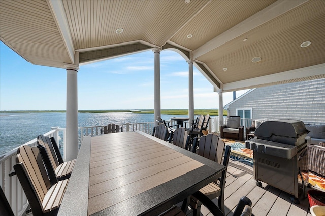 dock area featuring a water view