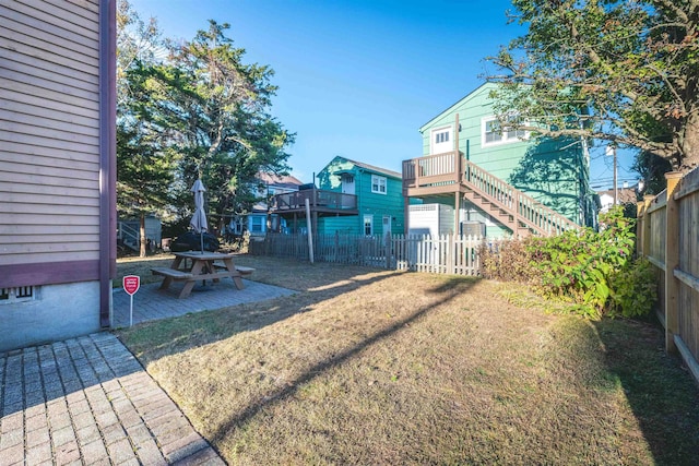 view of yard with a patio and a fenced backyard