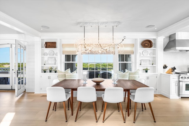 74 38th St, Avalon, NJ 08202 - dining area featuring a chandelier, light wood finished floors, and crown molding