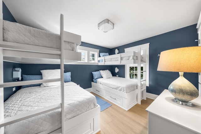 74 38th St, Avalon, NJ 08202 - bedroom with light wood-type flooring and baseboards
