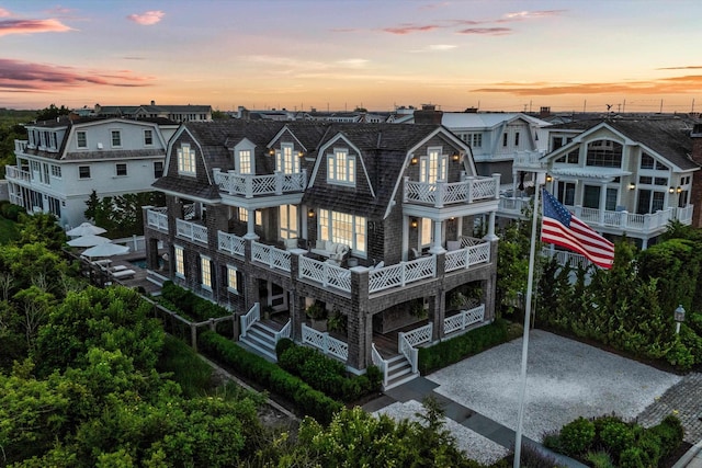 74 38th St, Avalon, NJ 08202 - rear view of house with a balcony