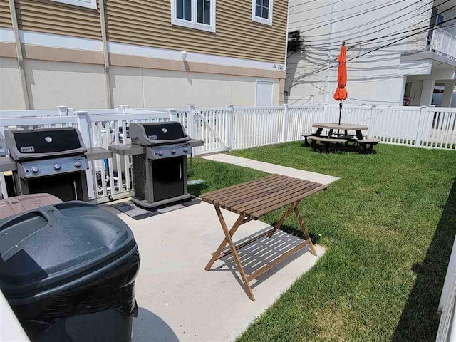 view of patio featuring a grill