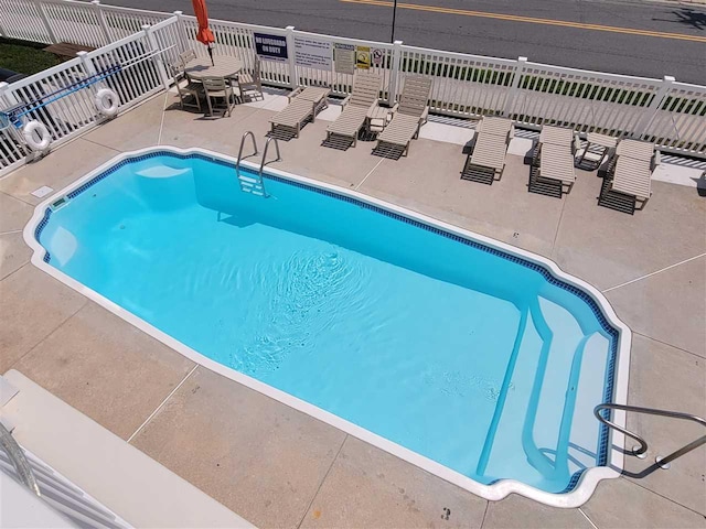 view of pool with a patio