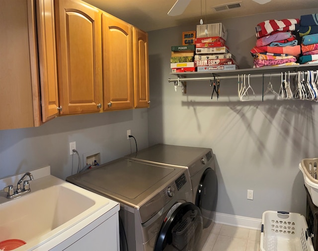 105 E Primrose Rd Unit 105, Wildwood Crest, NJ 08260 - washroom featuring washing machine and clothes dryer, cabinet space, and tile patterned floors