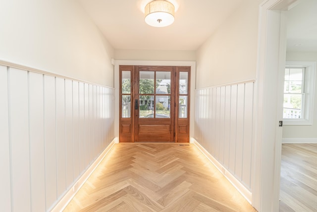 146 22nd St, Avalon, NJ 08202 - doorway with healthy amount of natural light and a wainscoted wall