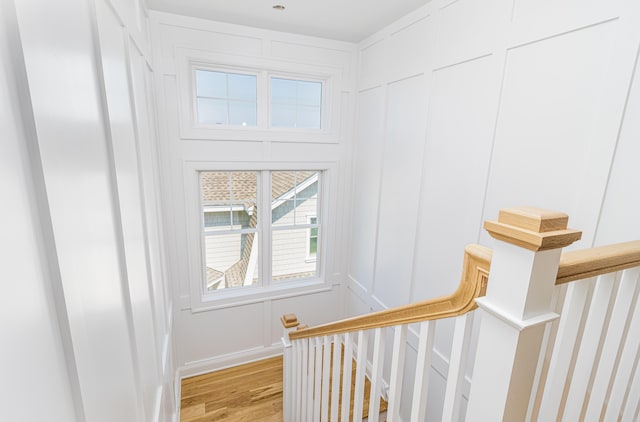 146 22nd St, Avalon, NJ 08202 - staircase featuring wood finished floors and a decorative wall