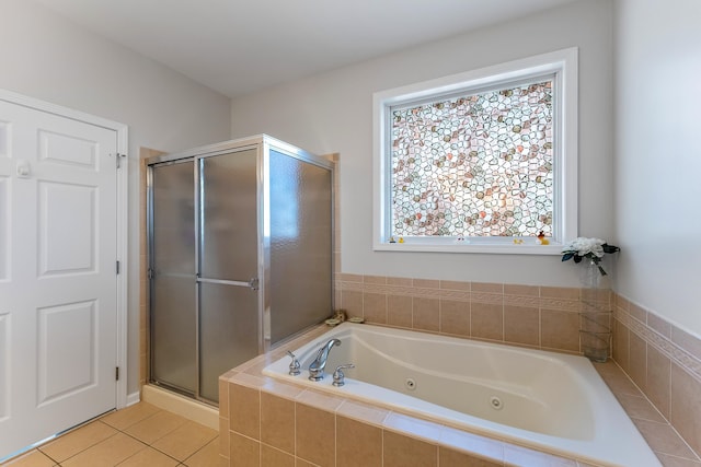3401 Seaboard Cir Unit 3401, North Wildwood, NJ 08260 - full bathroom with a shower stall, tile patterned flooring, and a jetted tub