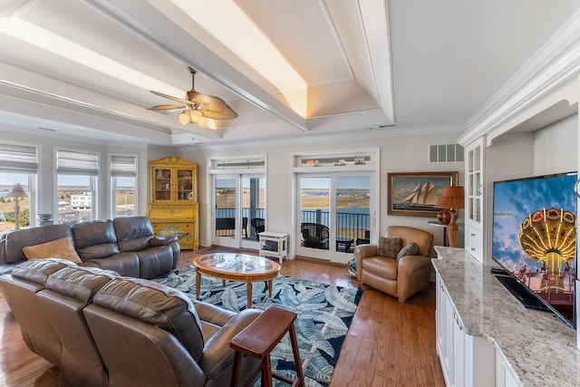 3401 Seaboard Cir Unit 3401, North Wildwood, NJ 08260 - living area featuring a ceiling fan, visible vents, light wood-style flooring, and a raised ceiling