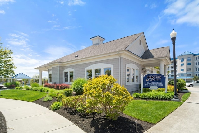 3401 Seaboard Cir Unit 3401, North Wildwood, NJ 08260 - exterior space with a yard and roof with shingles