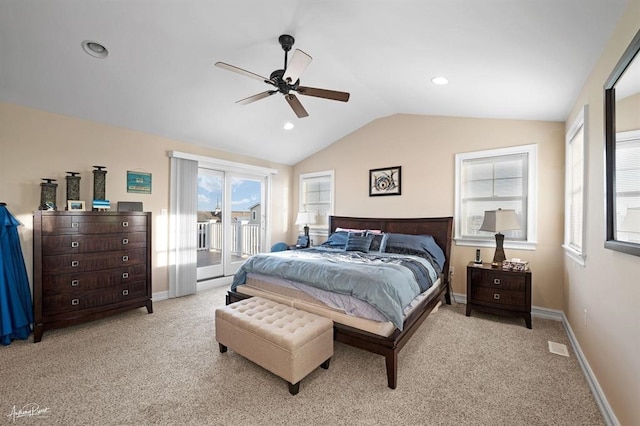 bedroom featuring carpet floors, access to outside, multiple windows, and vaulted ceiling