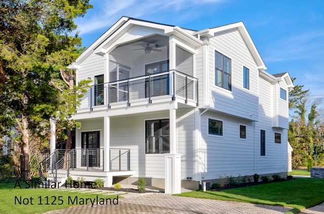 1125 Maryland Ave, Cape May, NJ 08204 - view of front of house with a balcony, ceiling fan, a front yard, and covered porch