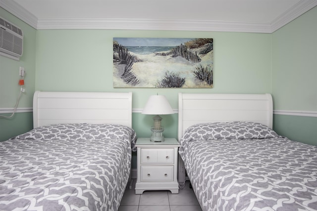 bedroom featuring ornamental molding, a wall unit AC, and light tile patterned floors