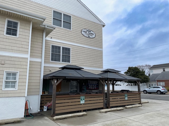 view of front of home featuring a gazebo