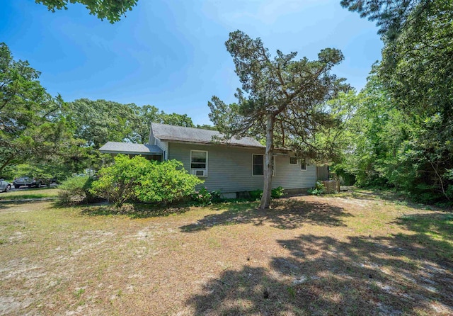 408 Princeton Ave, Cape May Point, NJ 08212 - view of side of property featuring cooling unit and a lawn