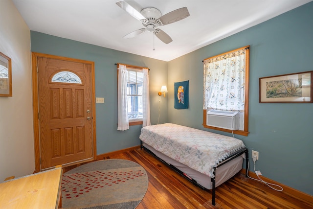 408 Princeton Ave, Cape May Point, NJ 08212 - bedroom featuring cooling unit, wood finished floors, and a ceiling fan