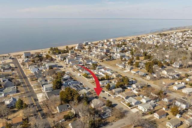 bird's eye view with a residential view and a water view