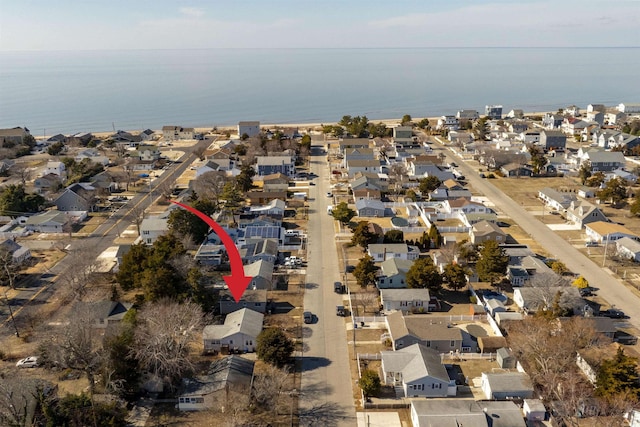 aerial view featuring a water view and a residential view