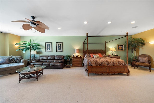 bedroom featuring light carpet and ceiling fan