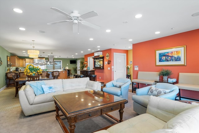 living room featuring ceiling fan and light carpet