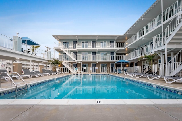 view of pool with fence