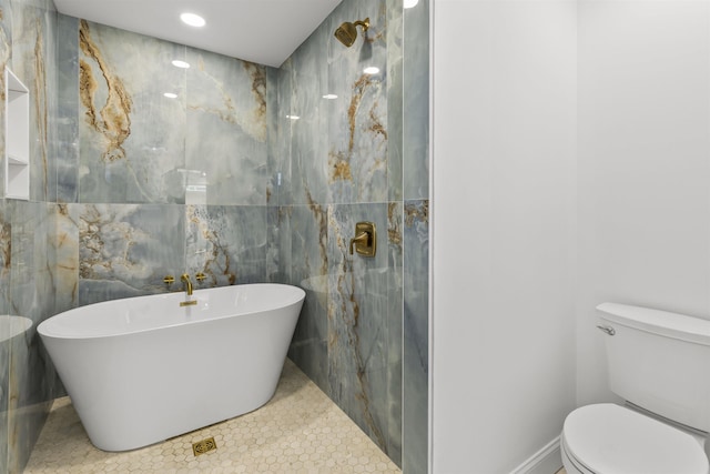 9 N 8th St, Del Haven, NJ 08251 - bathroom featuring a freestanding tub, tile walls, tile patterned floors, and recessed lighting