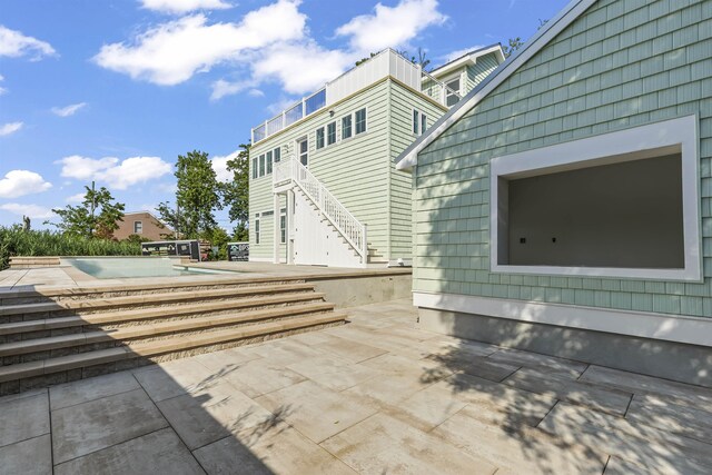 9 N 8th St, Del Haven, NJ 08251 - view of patio with stairway and an outdoor pool