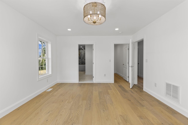 9 N 8th St, Del Haven, NJ 08251 - unfurnished bedroom featuring a chandelier, light wood-type flooring, recessed lighting, and connected bathroom