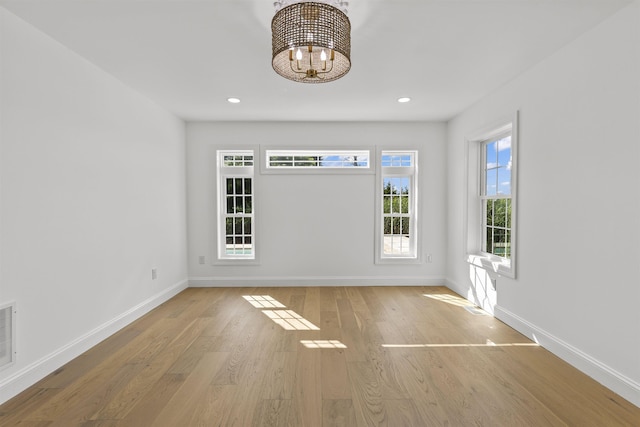 9 N 8th St, Del Haven, NJ 08251 - unfurnished room featuring wood finished floors, a chandelier, and recessed lighting