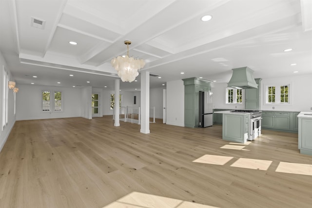 9 N 8th St, Del Haven, NJ 08251 - unfurnished living room with a chandelier, light wood-type flooring, beamed ceiling, recessed lighting, and coffered ceiling