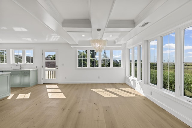 9 N 8th St, Del Haven, NJ 08251 - unfurnished sunroom with coffered ceiling, a chandelier, healthy amount of natural light, beam ceiling, and wood finished floors
