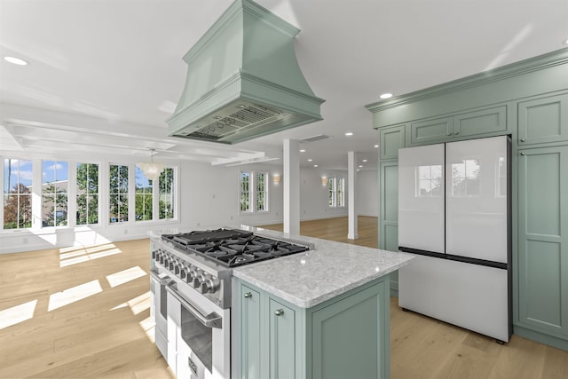 9 N 8th St, Del Haven, NJ 08251 - kitchen with freestanding refrigerator, high end stainless steel range oven, green cabinets, recessed lighting, and crown molding