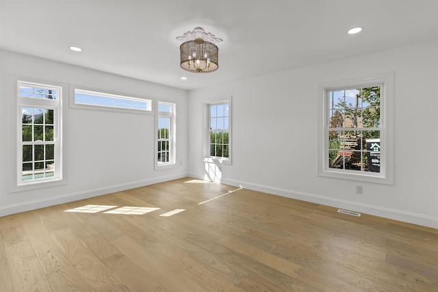 9 N 8th St, Del Haven, NJ 08251 - unfurnished room with recessed lighting, a chandelier, and light wood-style floors