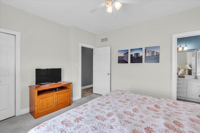 240 E Taylor Ave Unit 100, Wildwood, NJ 08260 - bedroom featuring carpet flooring, ensuite bathroom, and a ceiling fan