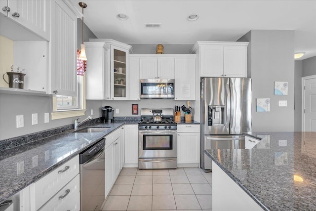 240 E Taylor Ave Unit 100, Wildwood, NJ 08260 - kitchen featuring stainless steel appliances, white cabinets, dark stone countertops, and recessed lighting