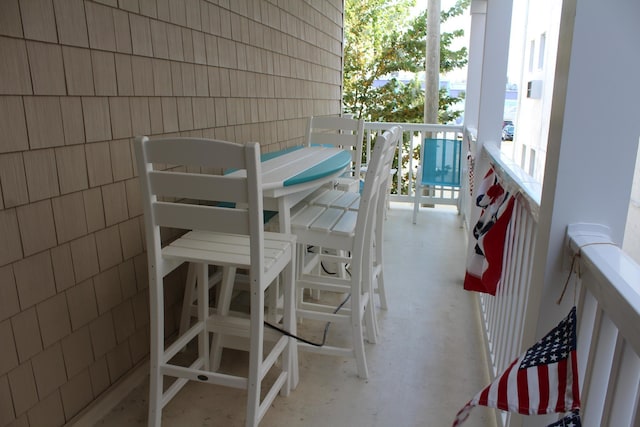 balcony featuring a porch